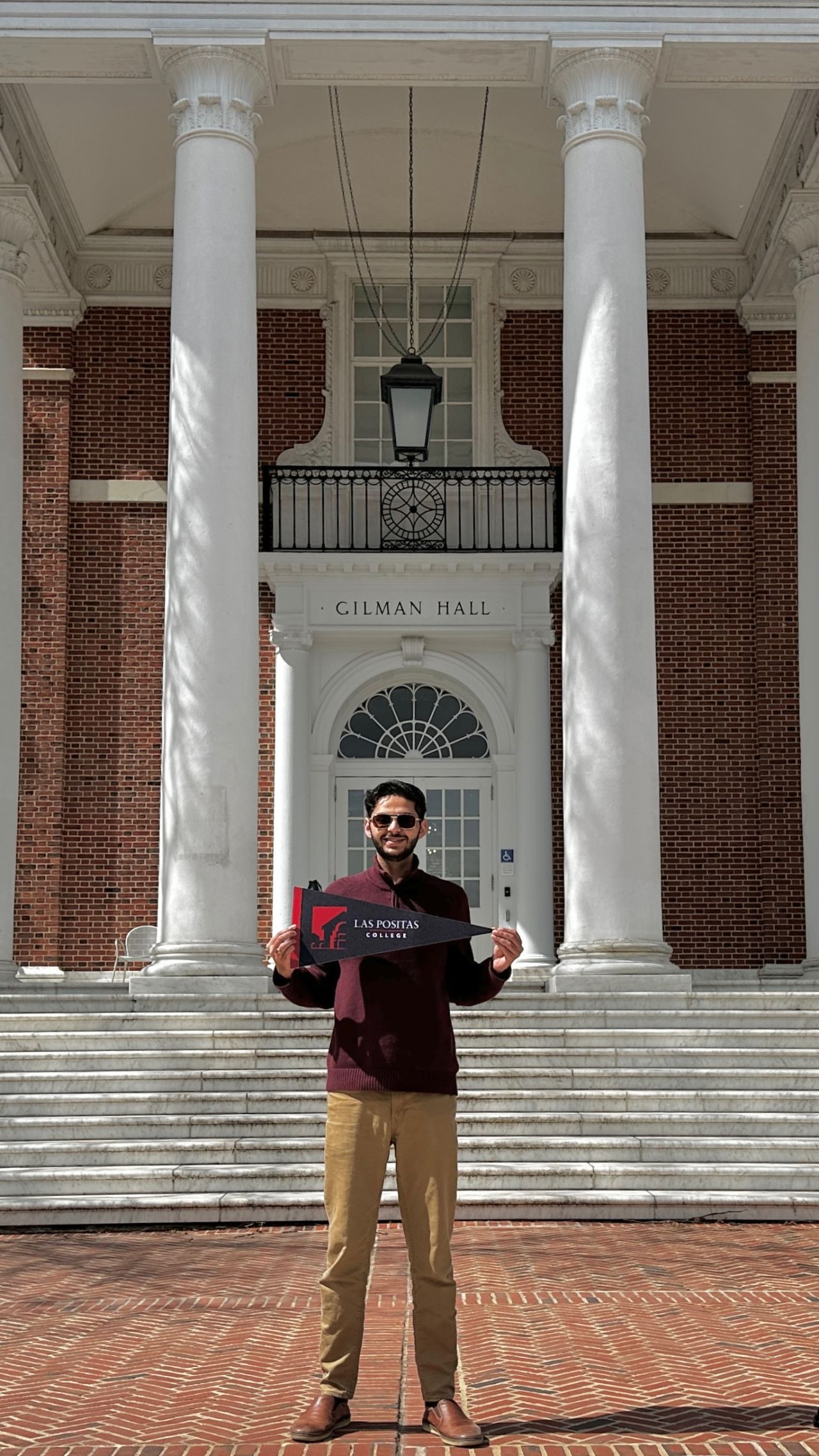Raza Ali in front of Johns Hopkins University