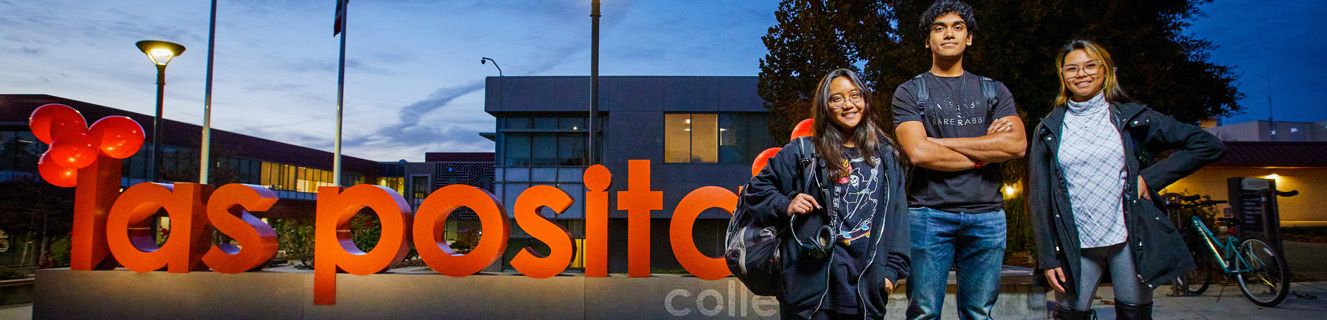 Students standing in front of the Las Positas sign.